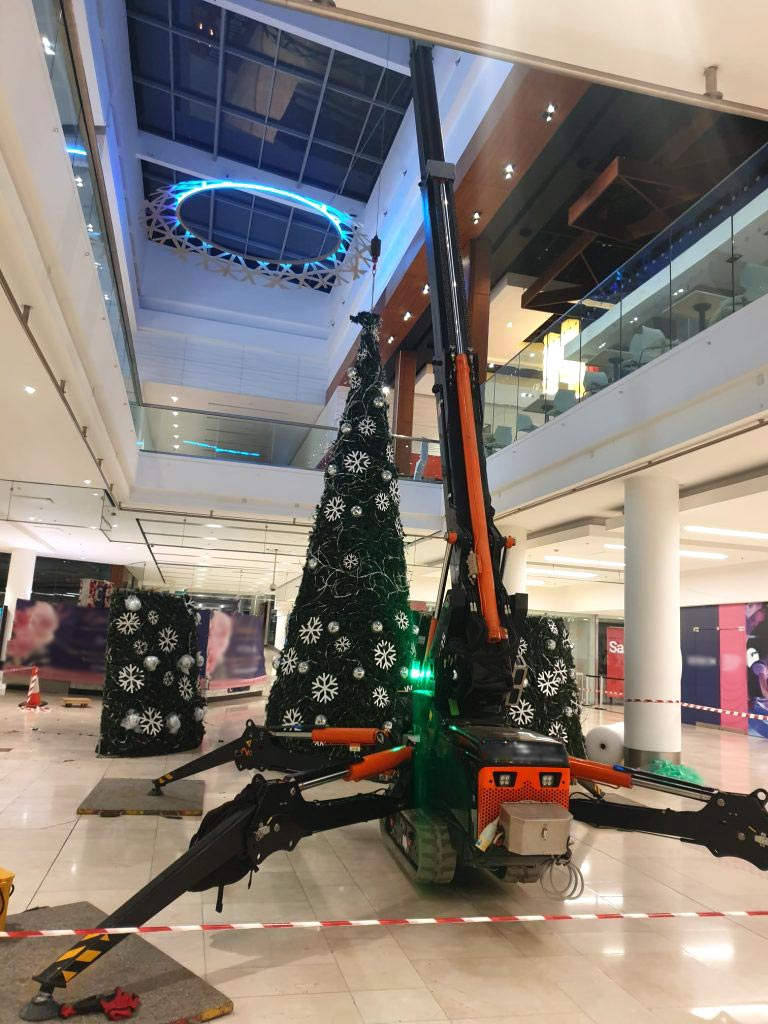 TMC 25 Articulated Crawler Crane on site indoors